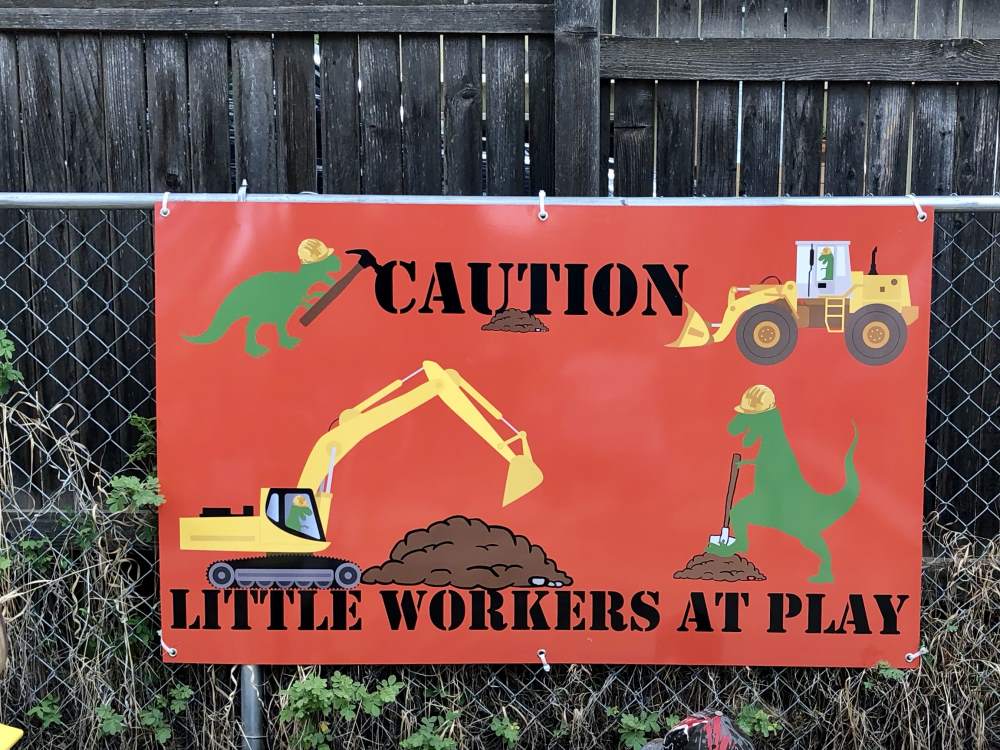 luccas workers at plan sign - luccas-workers-at-plan-sign